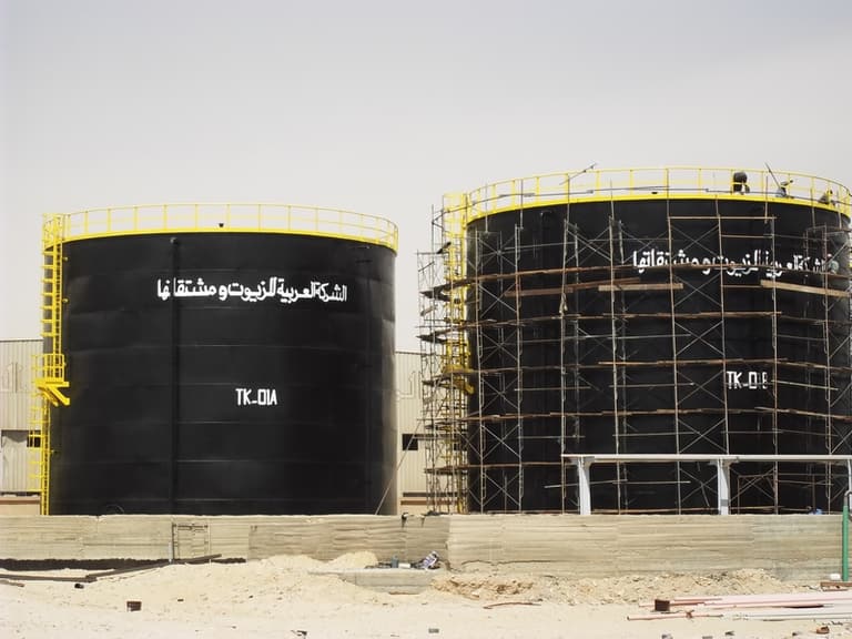 Industrial tanks with scaffold access and coating work